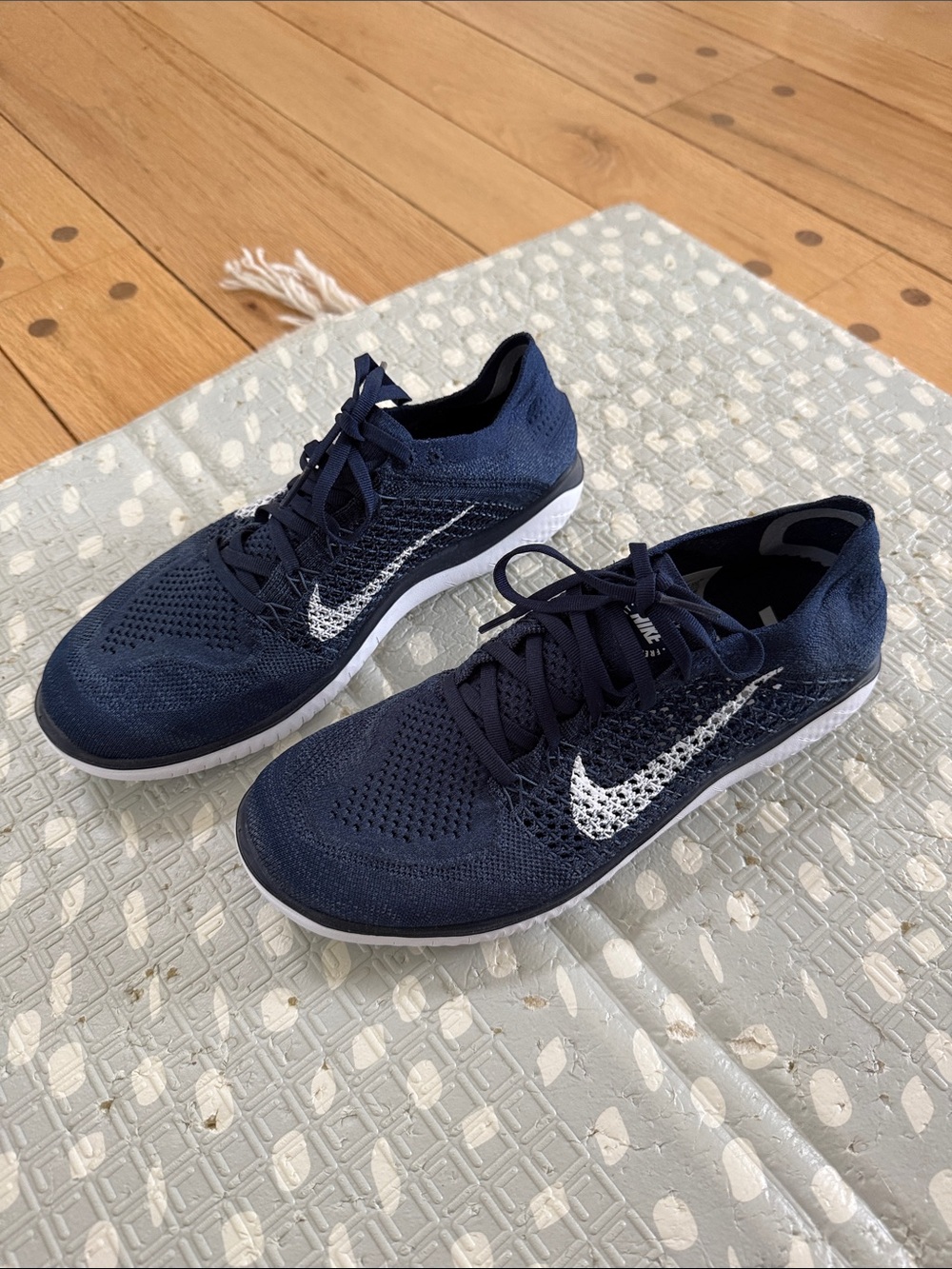 Nike Men’s Navy Flyknit Training Sneakers with White Swoosh